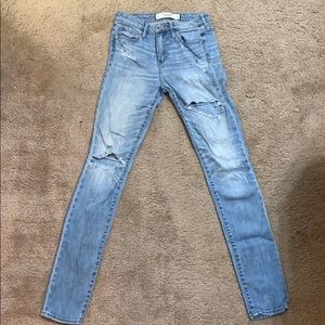 Distressed light wash jeans